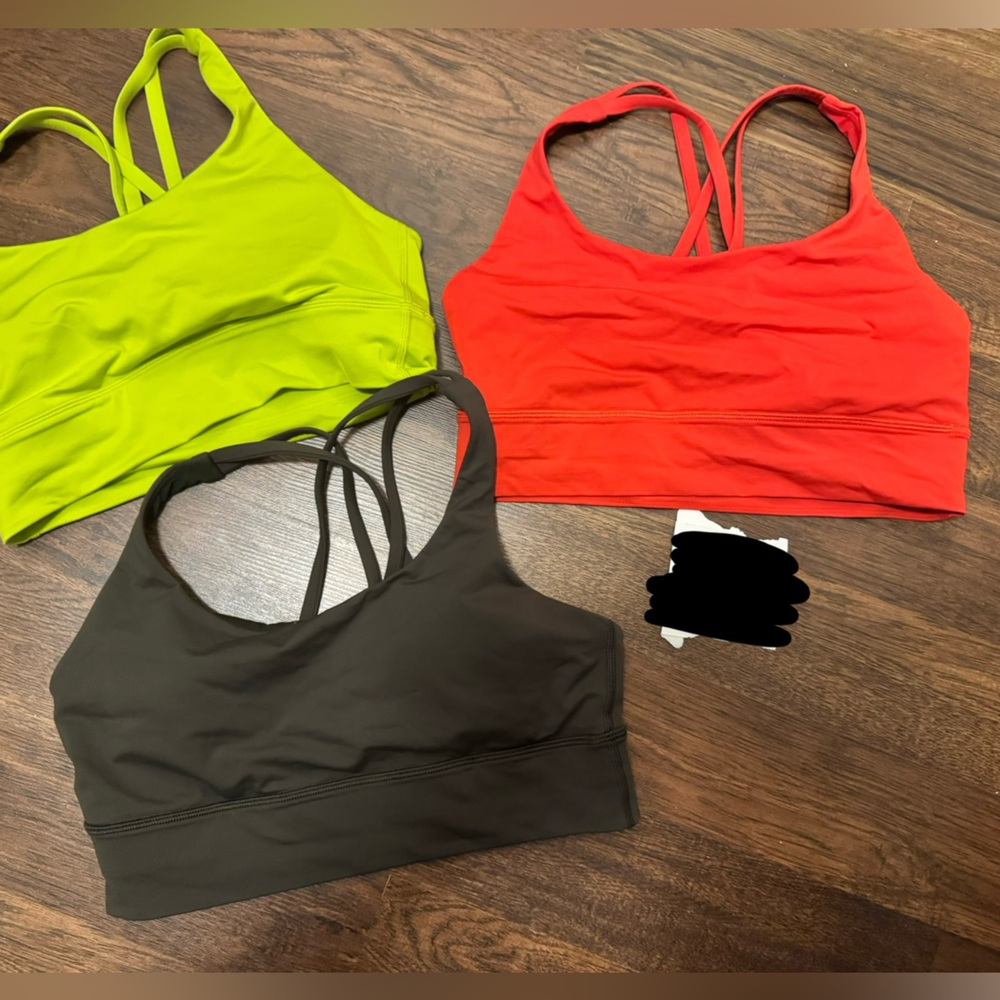 Lululemon Energy Set of Three Sports Bras in Red, Green, and Black